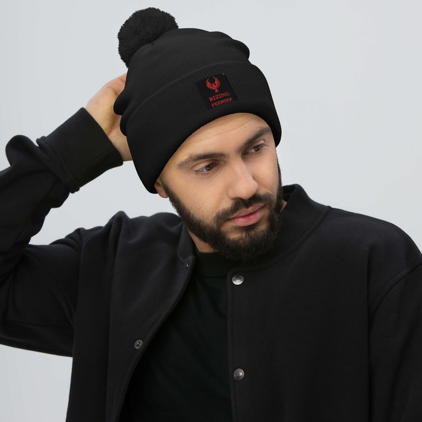 RIZING FEENIXX™ POM-POM BEANIE