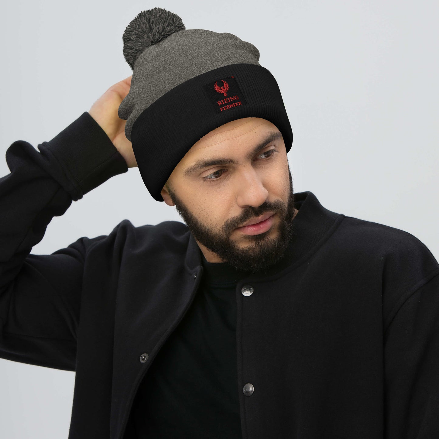 RIZING FEENIXX™ POM-POM BEANIE