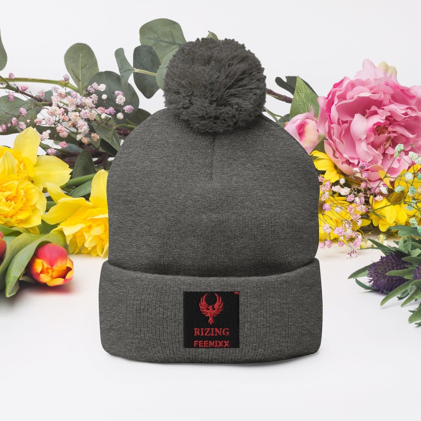 RIZING FEENIXX™ POM-POM BEANIE