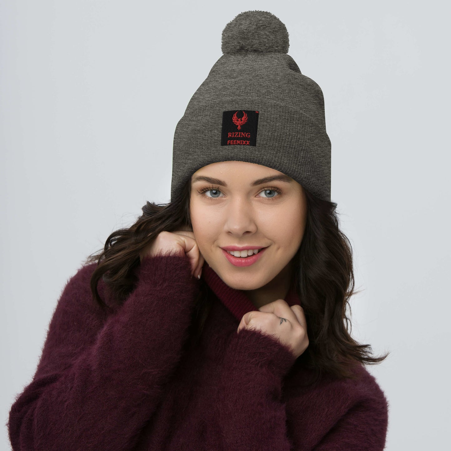 RIZING FEENIXX™ POM-POM BEANIE