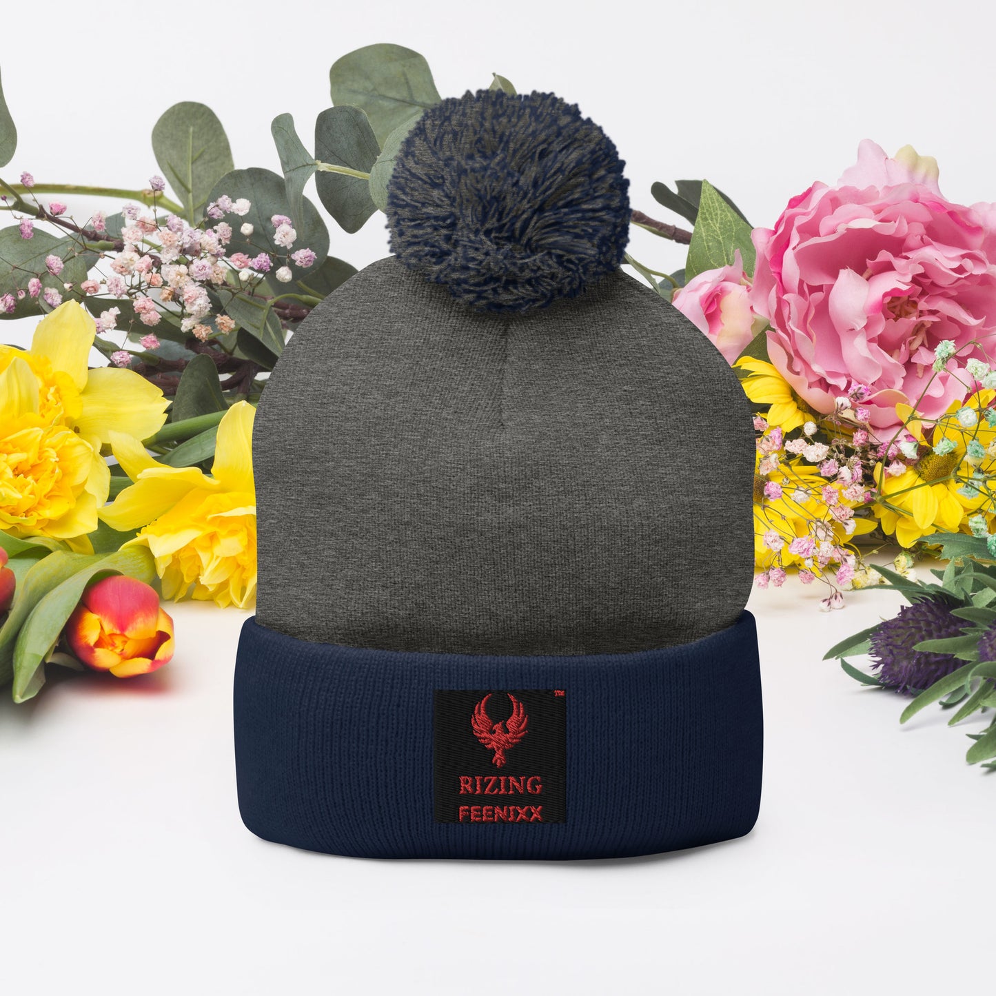 RIZING FEENIXX™ POM-POM BEANIE