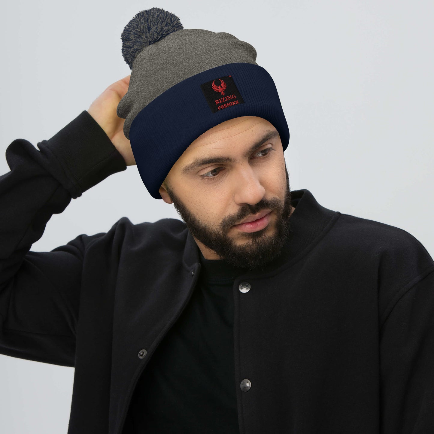 RIZING FEENIXX™ POM-POM BEANIE