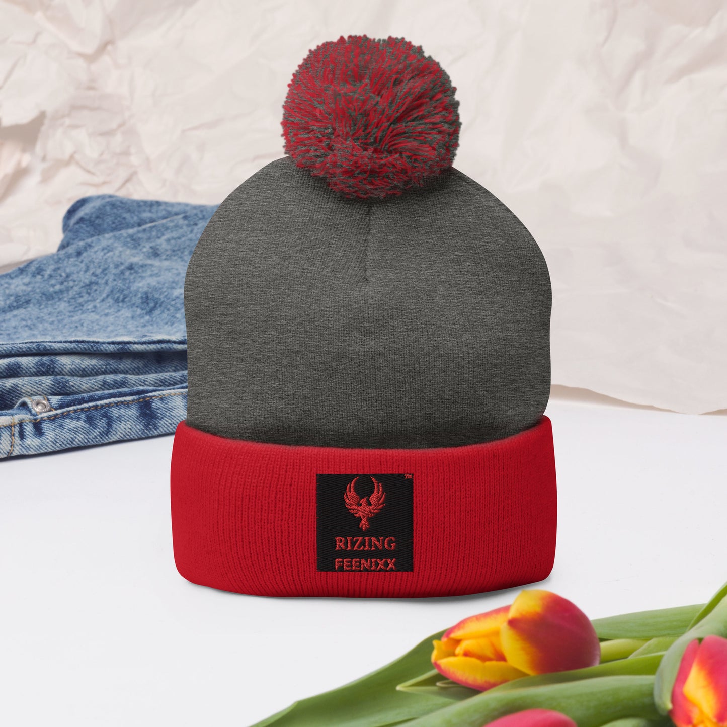 RIZING FEENIXX™ POM-POM BEANIE