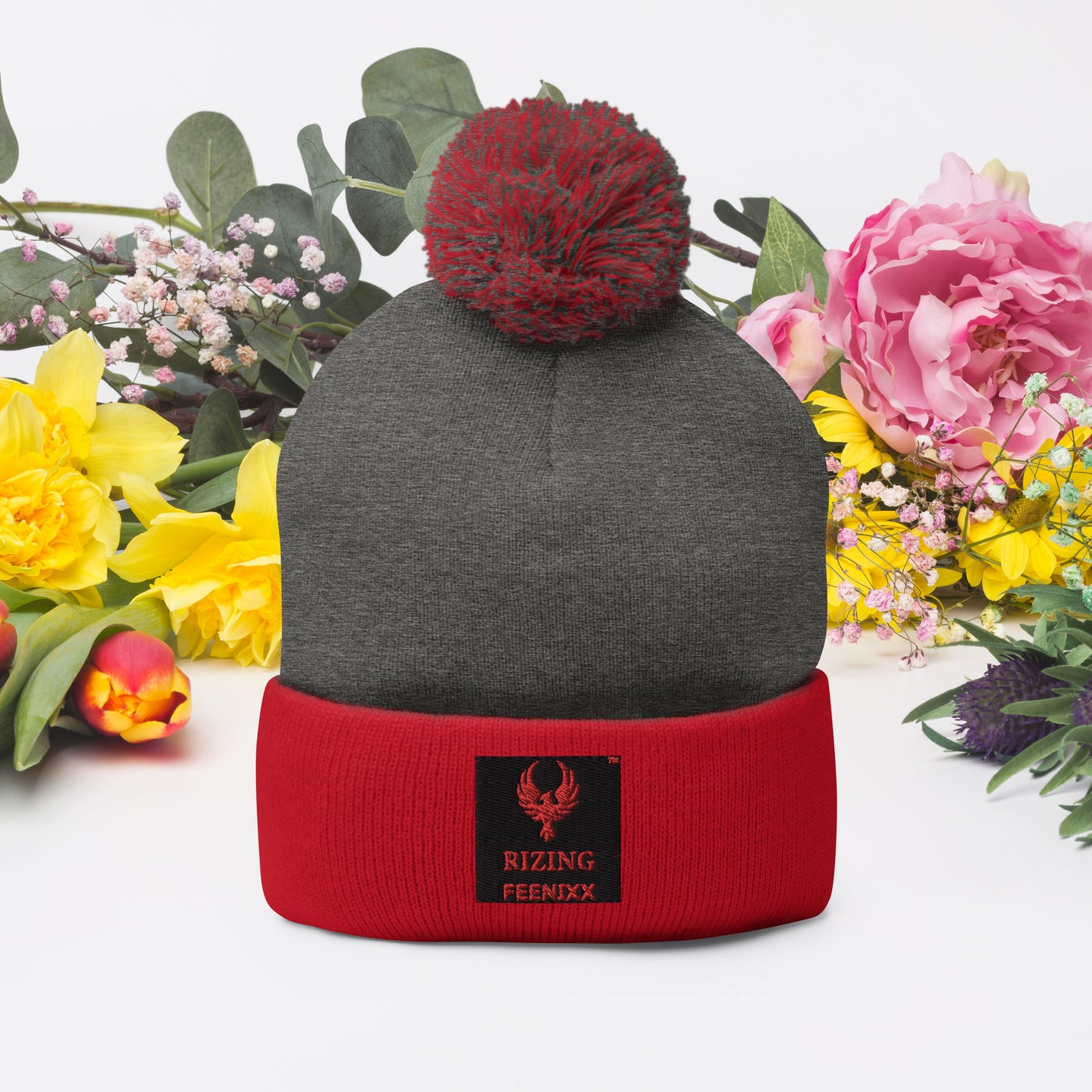 RIZING FEENIXX™ POM-POM BEANIE