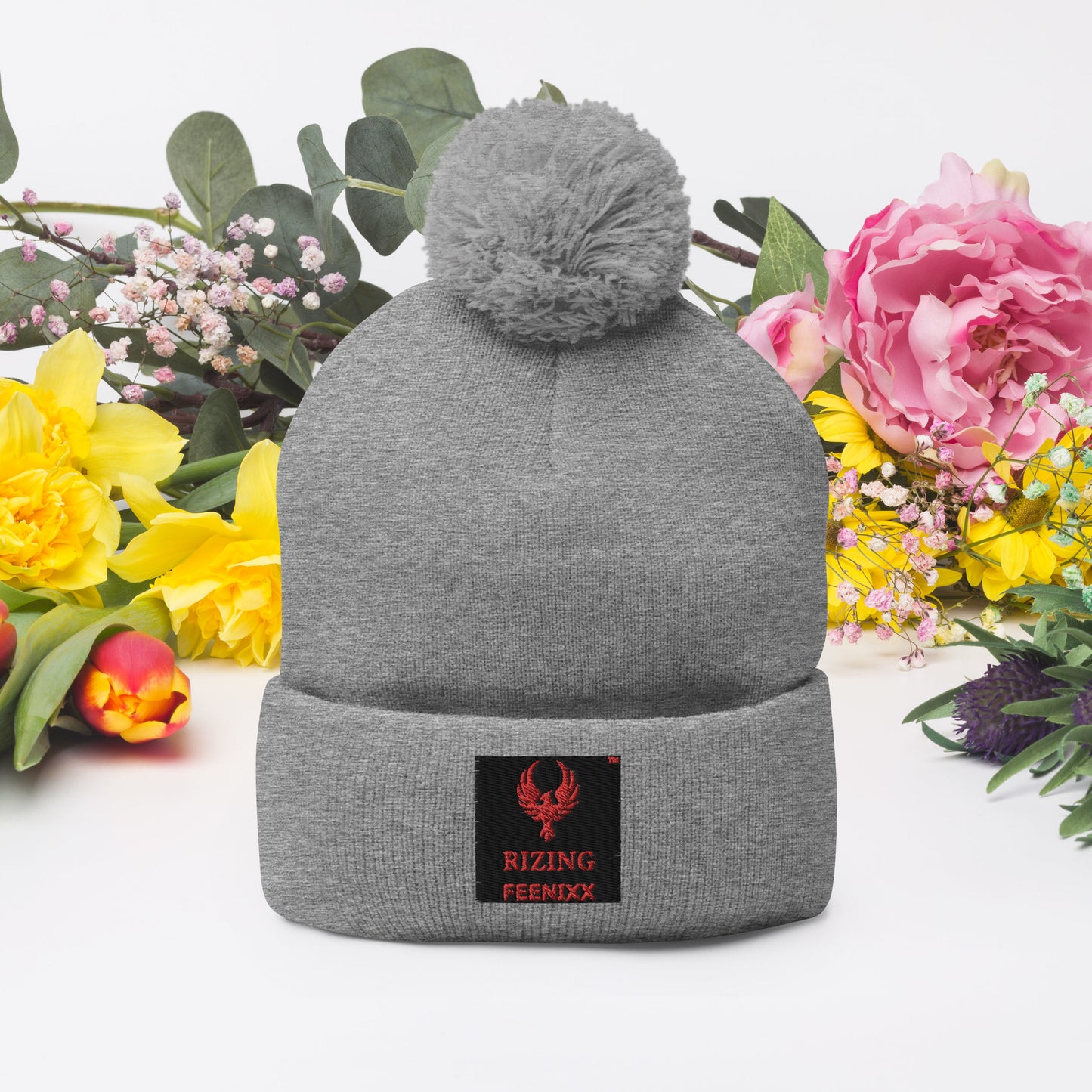 RIZING FEENIXX™ POM-POM BEANIE