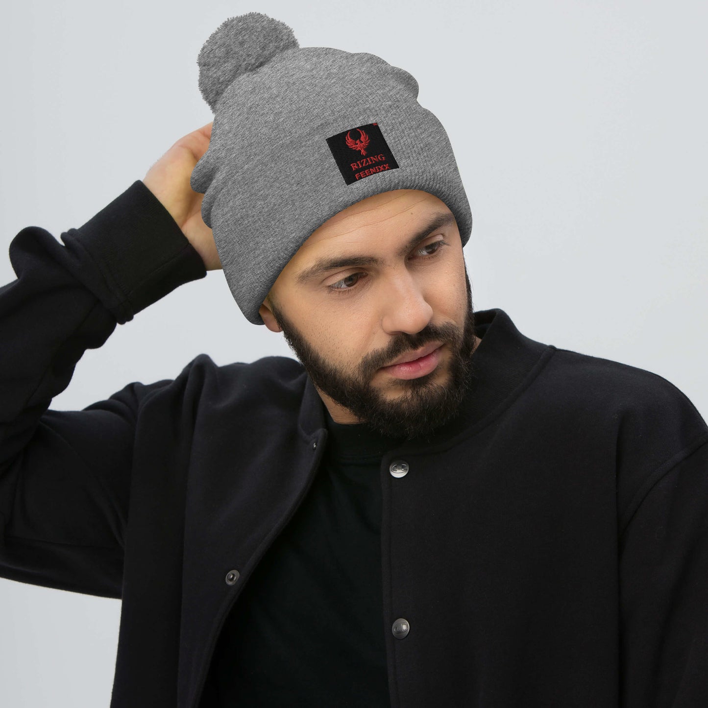 RIZING FEENIXX™ POM-POM BEANIE