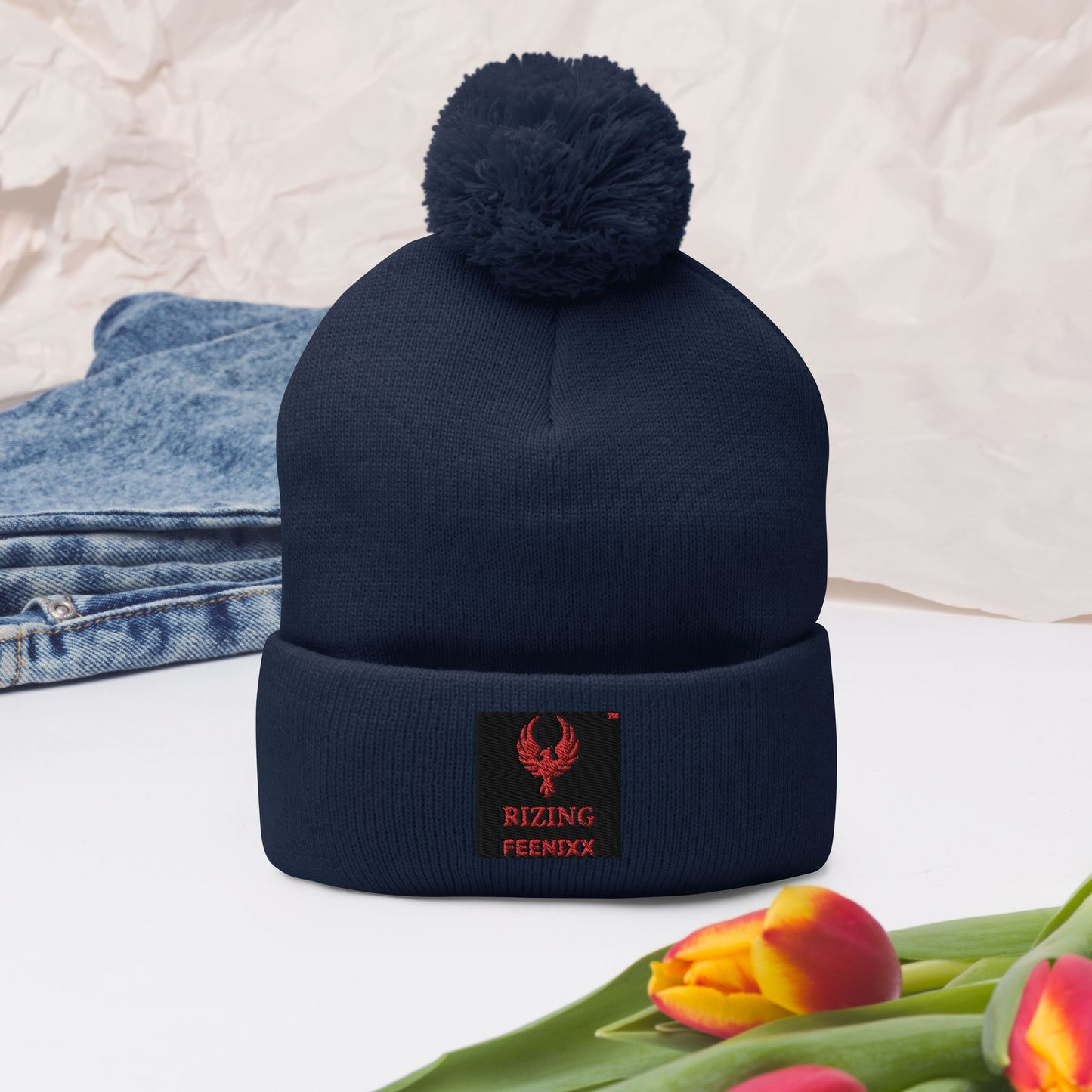 RIZING FEENIXX™ POM-POM BEANIE