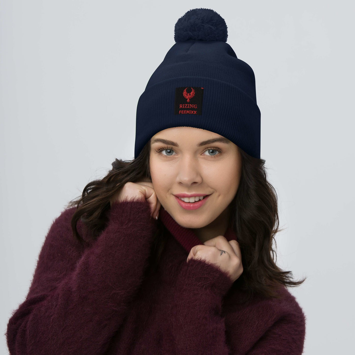 RIZING FEENIXX™ POM-POM BEANIE