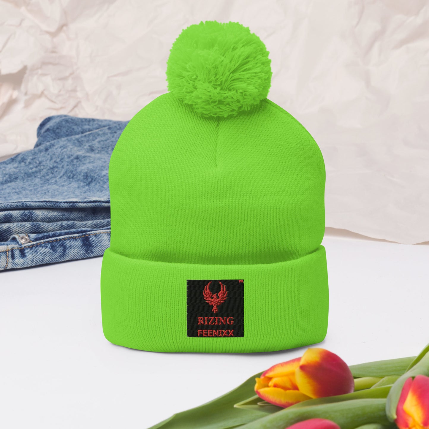 RIZING FEENIXX™ POM-POM BEANIE