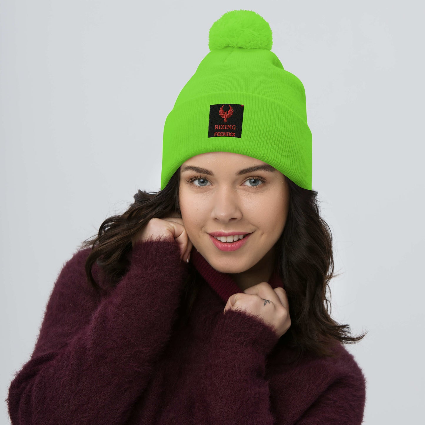 RIZING FEENIXX™ POM-POM BEANIE