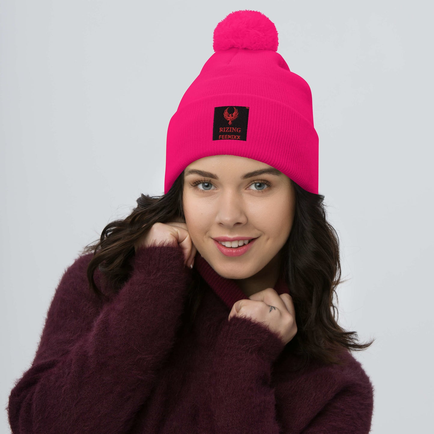 RIZING FEENIXX™ POM-POM BEANIE
