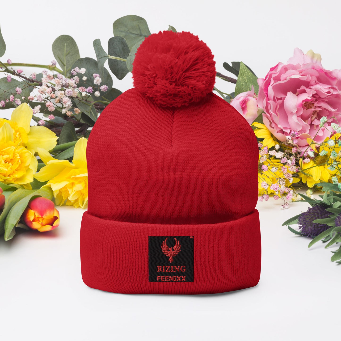 RIZING FEENIXX™ POM-POM BEANIE