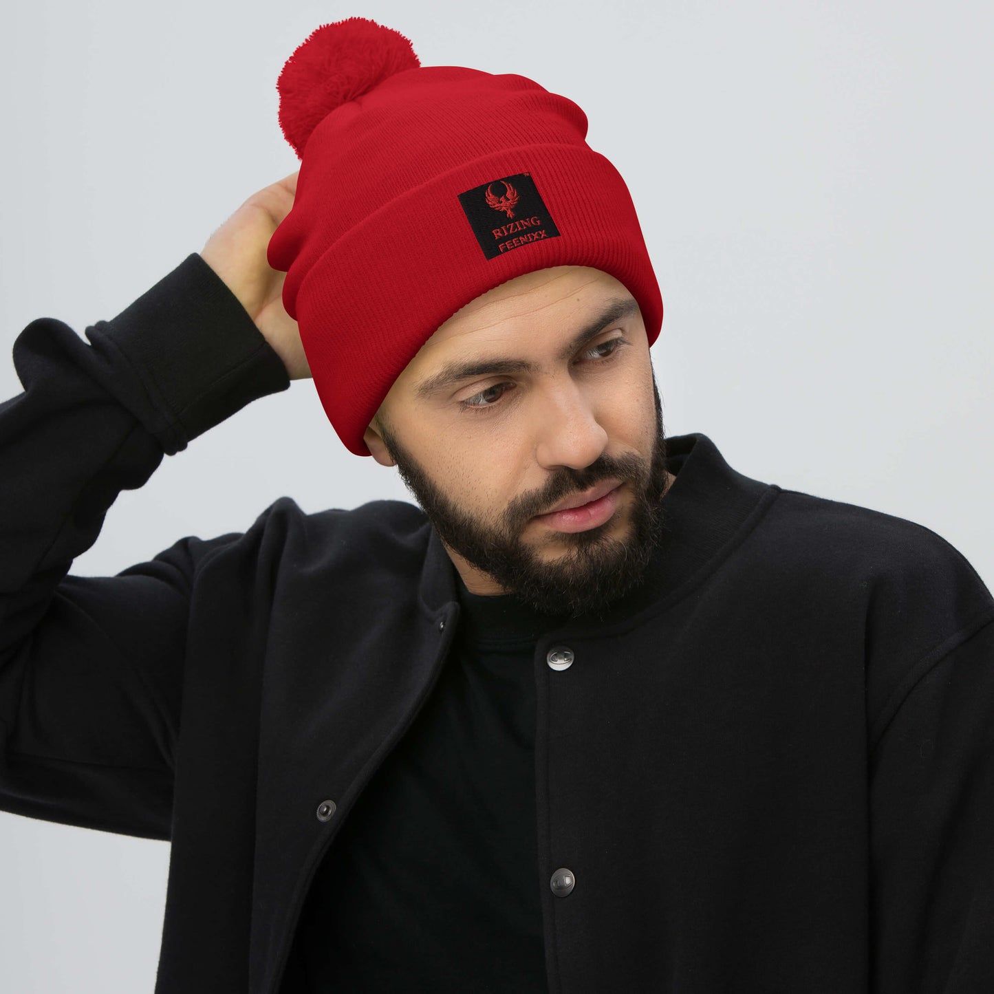 RIZING FEENIXX™ POM-POM BEANIE
