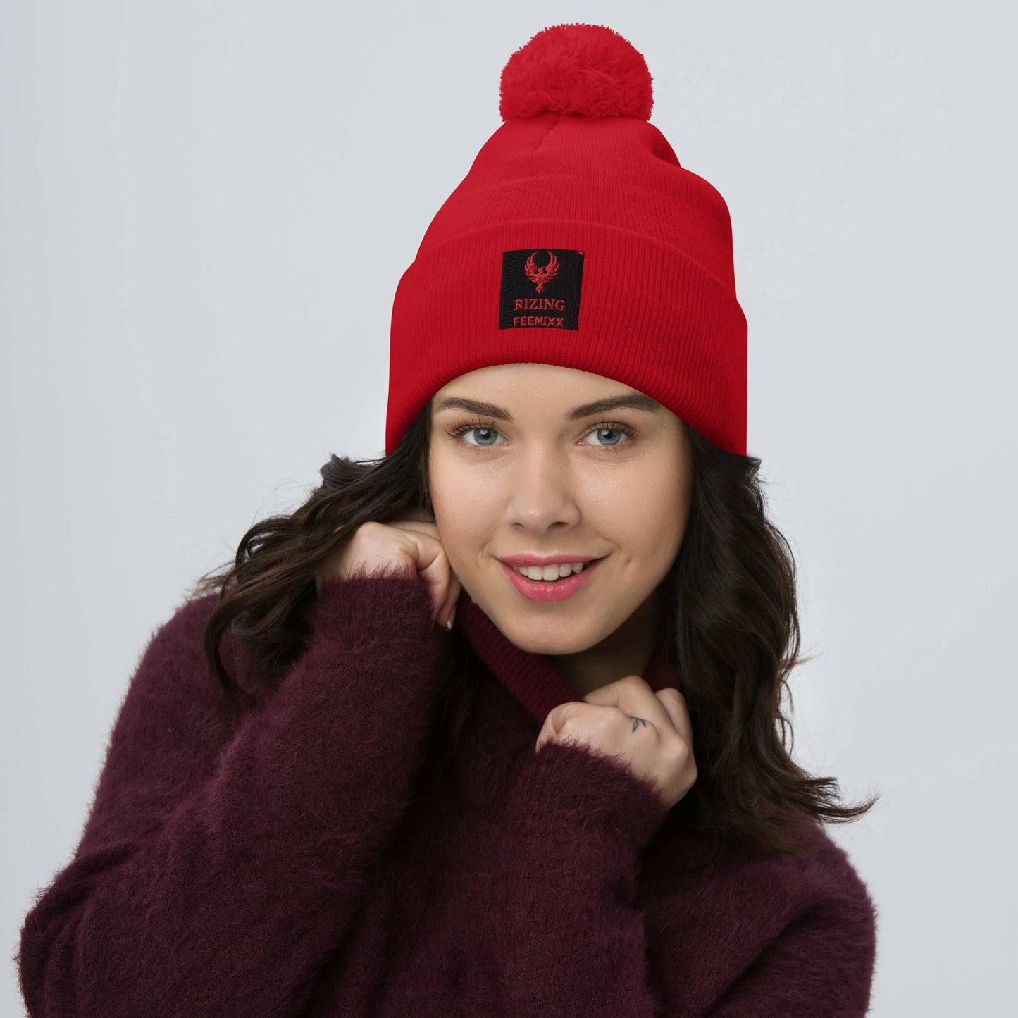 RIZING FEENIXX™ POM-POM BEANIE