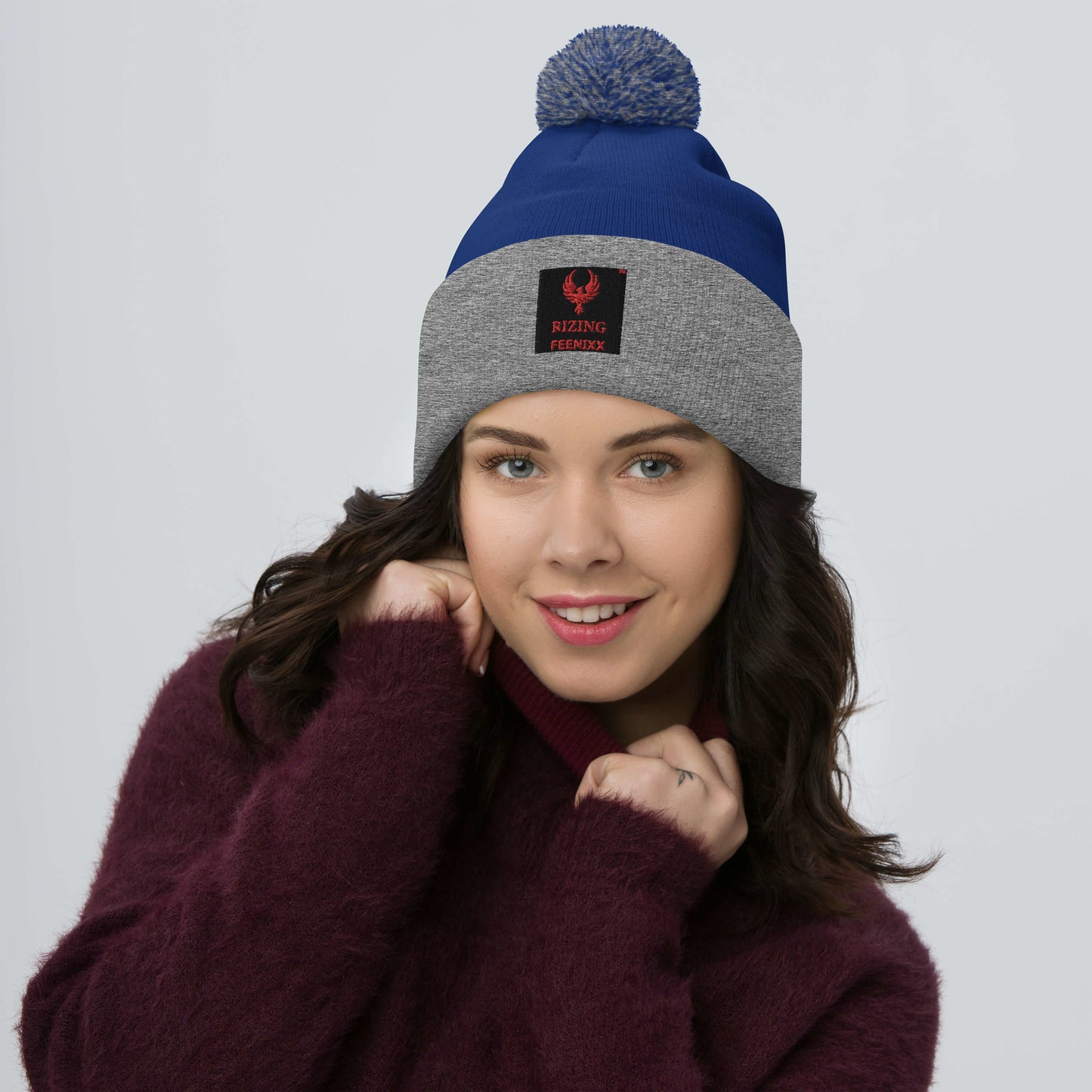 RIZING FEENIXX™ POM-POM BEANIE